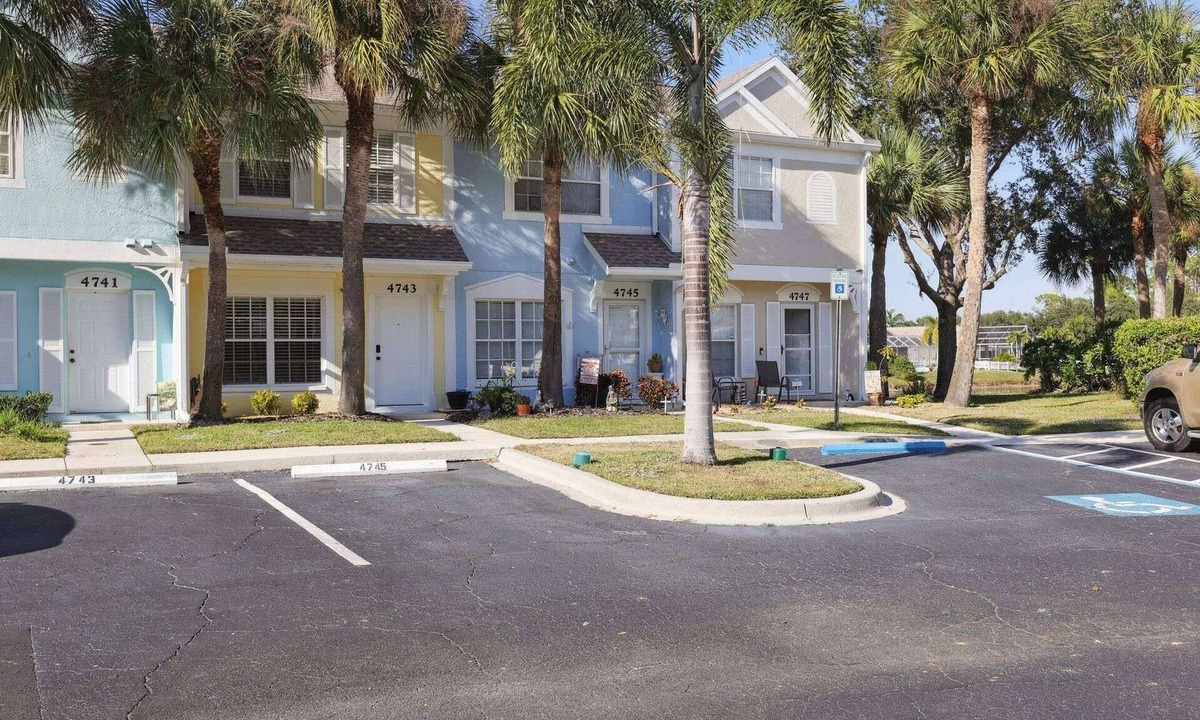 Sabal Harbour House | Peaceful Lakeside Stay with Private Screened Patio-Community Pool-Near Beaches