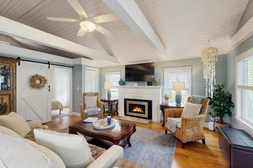 Pocasset House | Peaceful marshview escape with large sunroom AC outdoor firepit & dog friendly