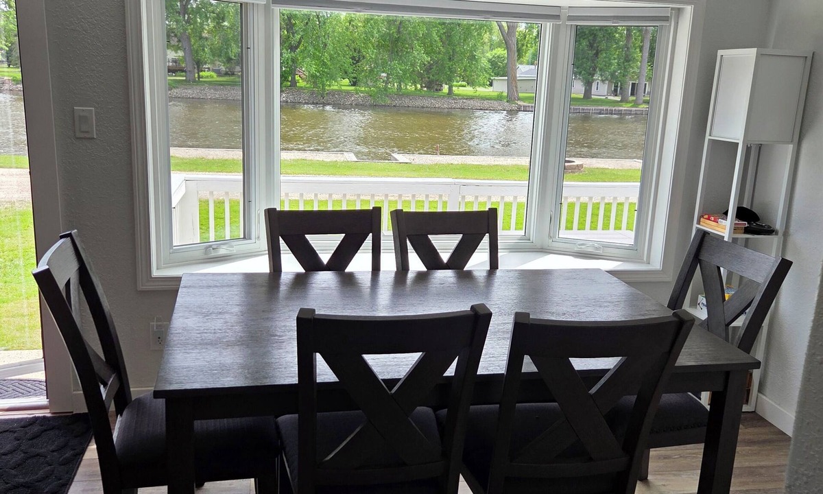 Omro House | Peaceful Riverfront - all amenities for fishing or friends/family getaway!