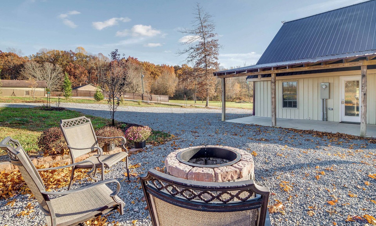 Russell Springs Cottage | Peaceful Russell Springs Home w/Fire Pit & Pond!
