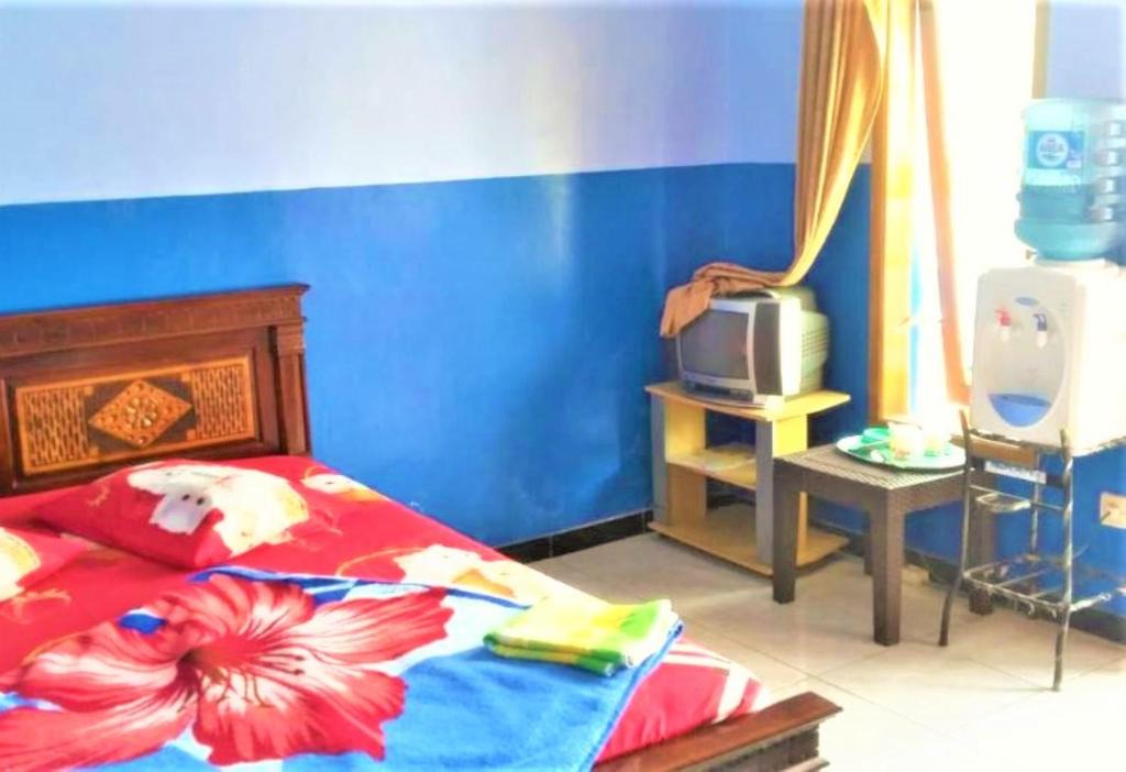 Sidomulyo Hotel | Penginapan Rezeki