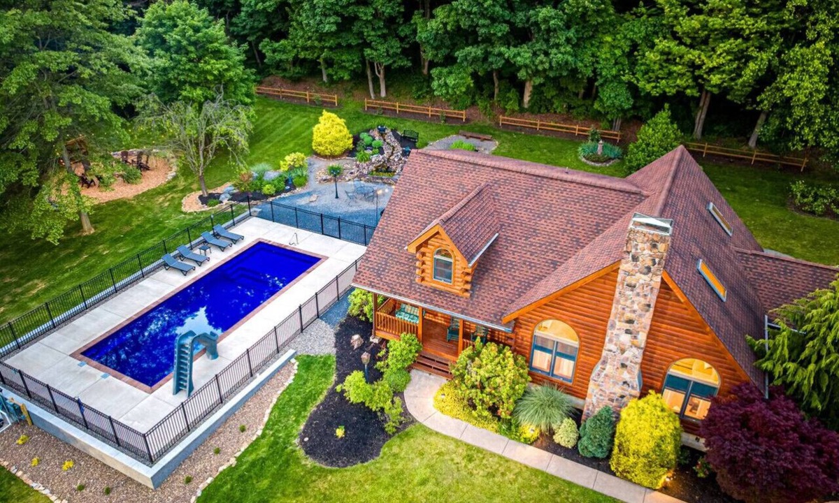 Mount Pleasant Mills Cabin | Perfect for couples, families, or small groups, this retreat blends serenity with style for an unforgettable getaway. Plenty of amenities to keep the family entertained indoors and out!