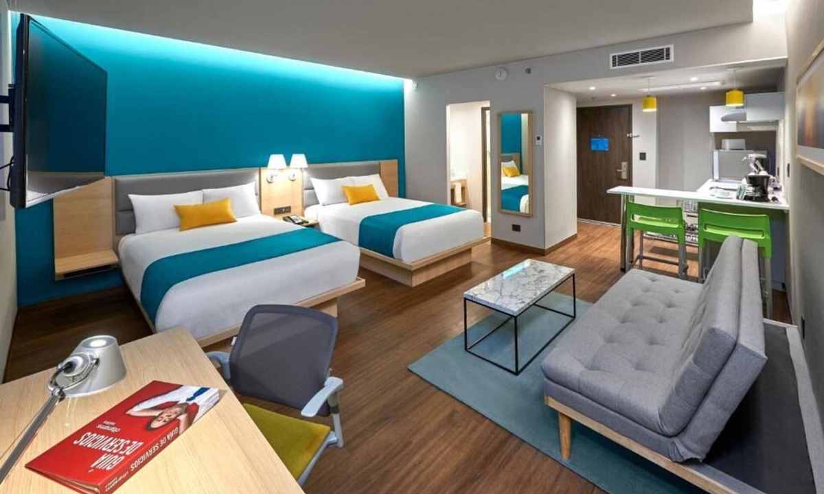 Cancun Apartment | Perfect for Groups: 2-Room Stay Near Airport + Pool, Free Shuttle & Breakfast