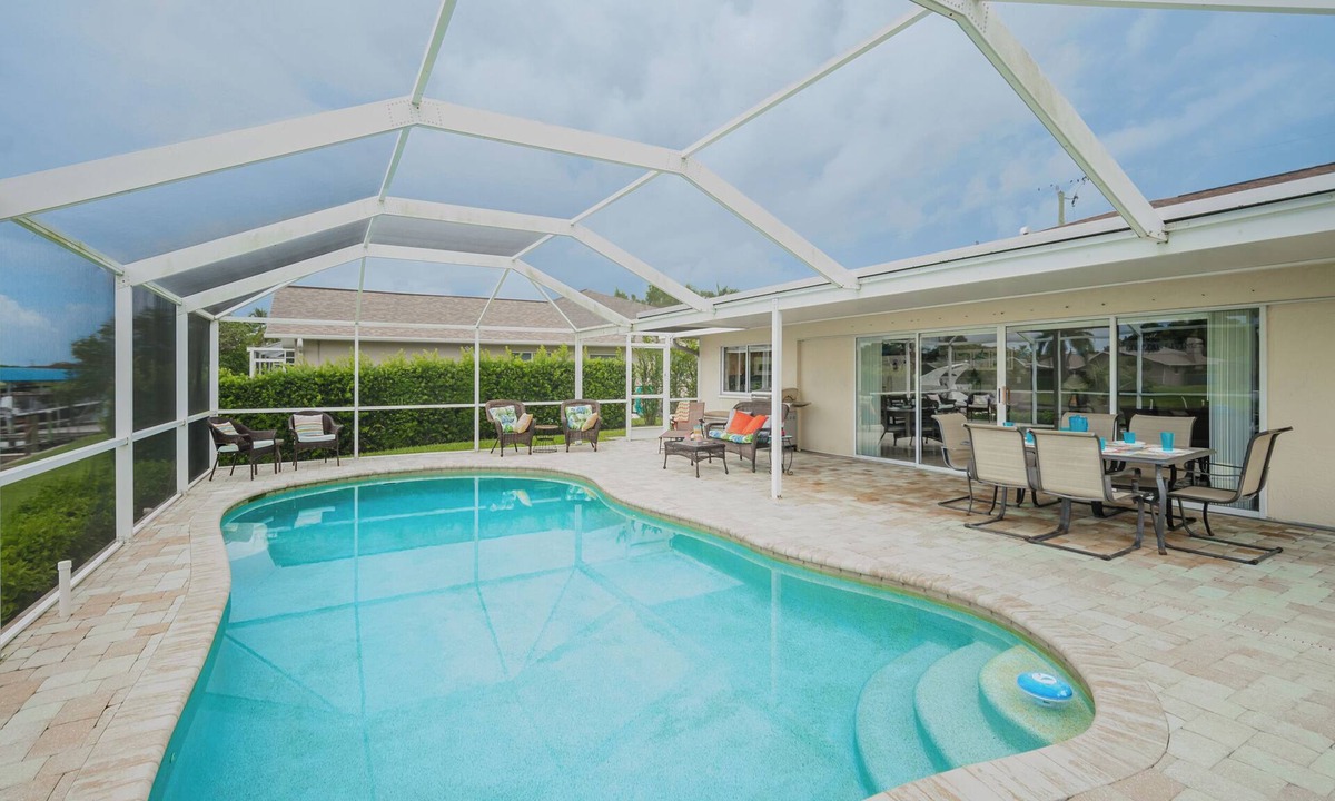 Fort Myers House | Pet friendly direct gulf access villa w/heated pool & kayaks! Villa Frances - SWFL Rentals