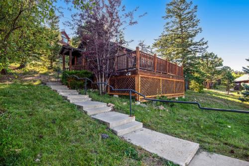 Estes Park House | Pet Friendly! Historic cabin with an amazing mountain view, gas fireplace, two decks, & WiFi