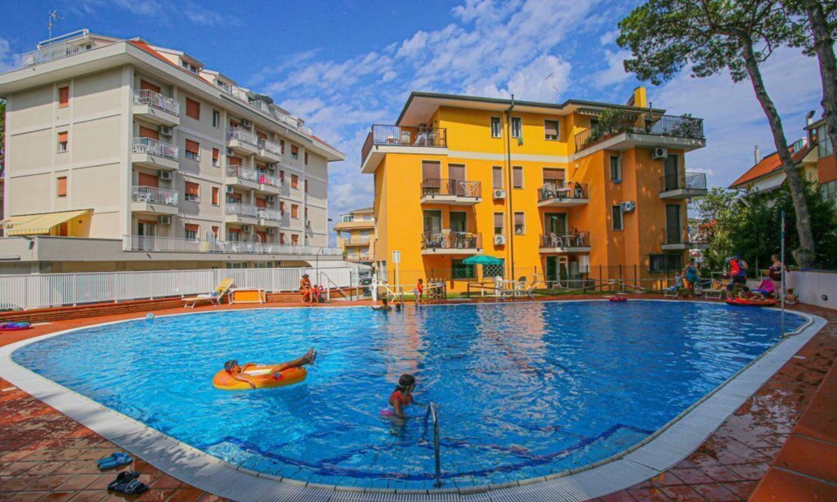 Eraclea Mare Apartment | Pine forest front apartment with swimming pool max 5 people wi-fi