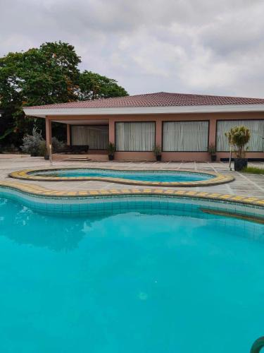 Lubao Resort | Poolside Cottage