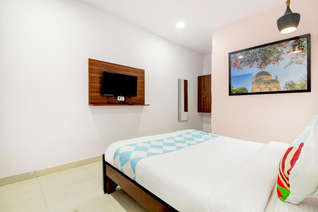 Hyderabad Hotel | POP HOME 79924 Pramod Prime Homes