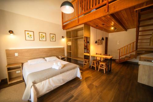 Jardim Andira Hotel | Pousada Estilo de Campos