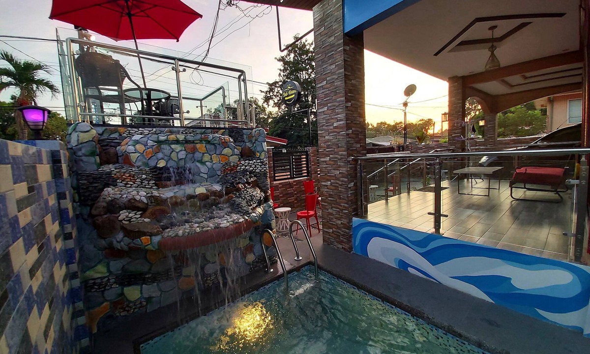 San Narciso House | Prestige Grounds Guesthouse with Lap Pool and Billiards