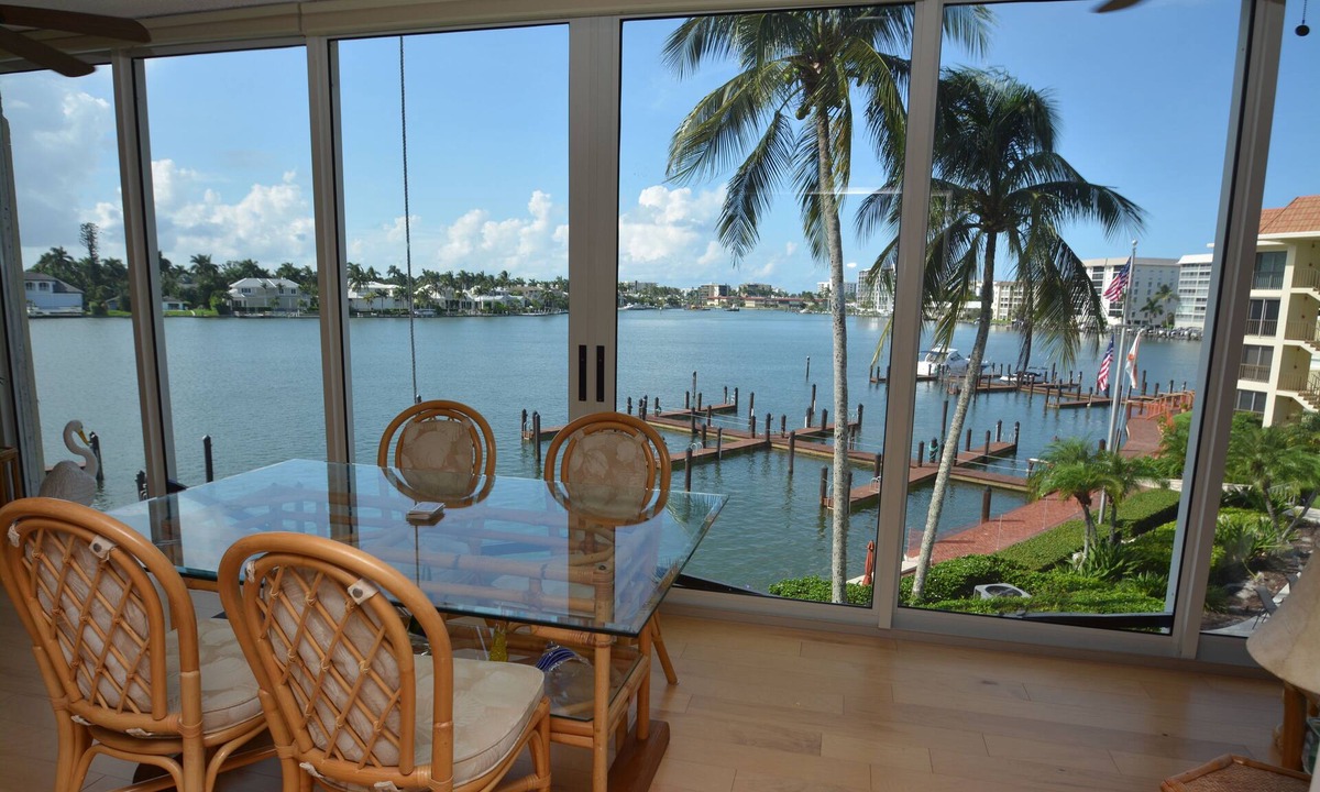 Moorings Condo | Prime Waterfront Location overlooking Moorings Bay. 7 minute walk to the beach