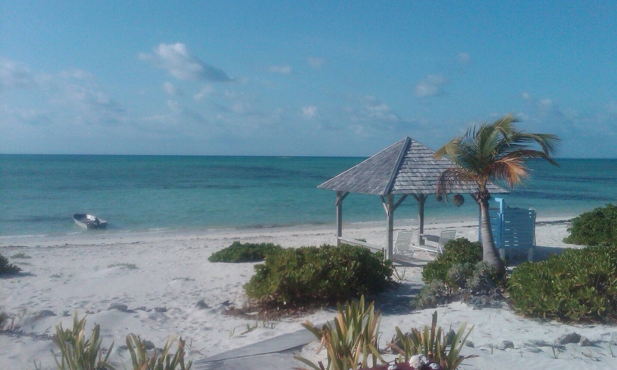 Bahama Palm Shores Cottage | Private Beach House on Casuarina Bonefish Beach with Motorboat for Rent