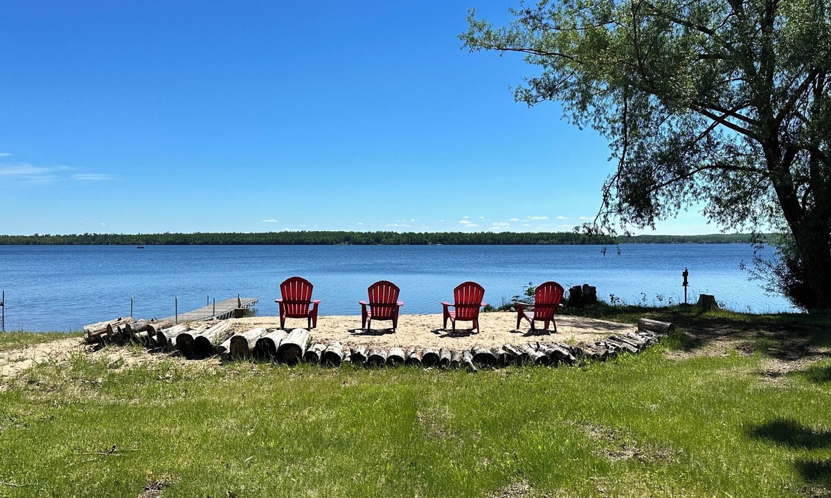 Carp Lake Cottage | Private beachfront cottage, WiFi and AC on Lake Paradise, minutes from Mackinaw