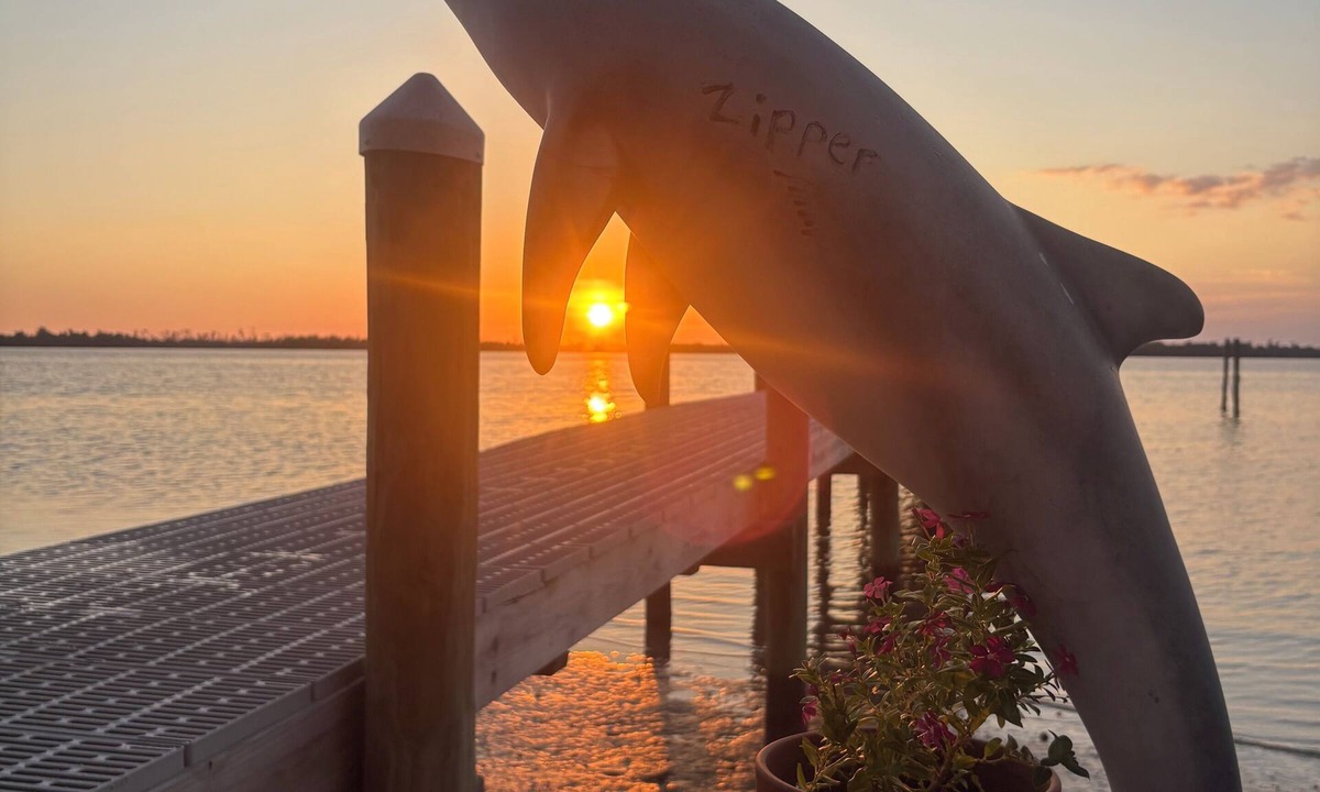 Parker House | Private dock with slips. 2 miles to Tyndall gate. Outdoor photos 1 block away