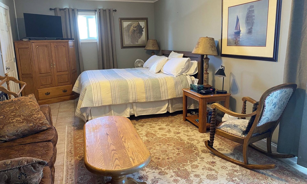 Ma-Me-O Beach House | Private guest suite with a king bed, in a country home, minutes from Wetaskiwin.