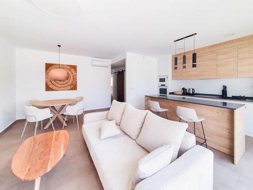 Los Cuarteros Apartment | Private jacuzzi, 50m from the sea, pool,AC,parking