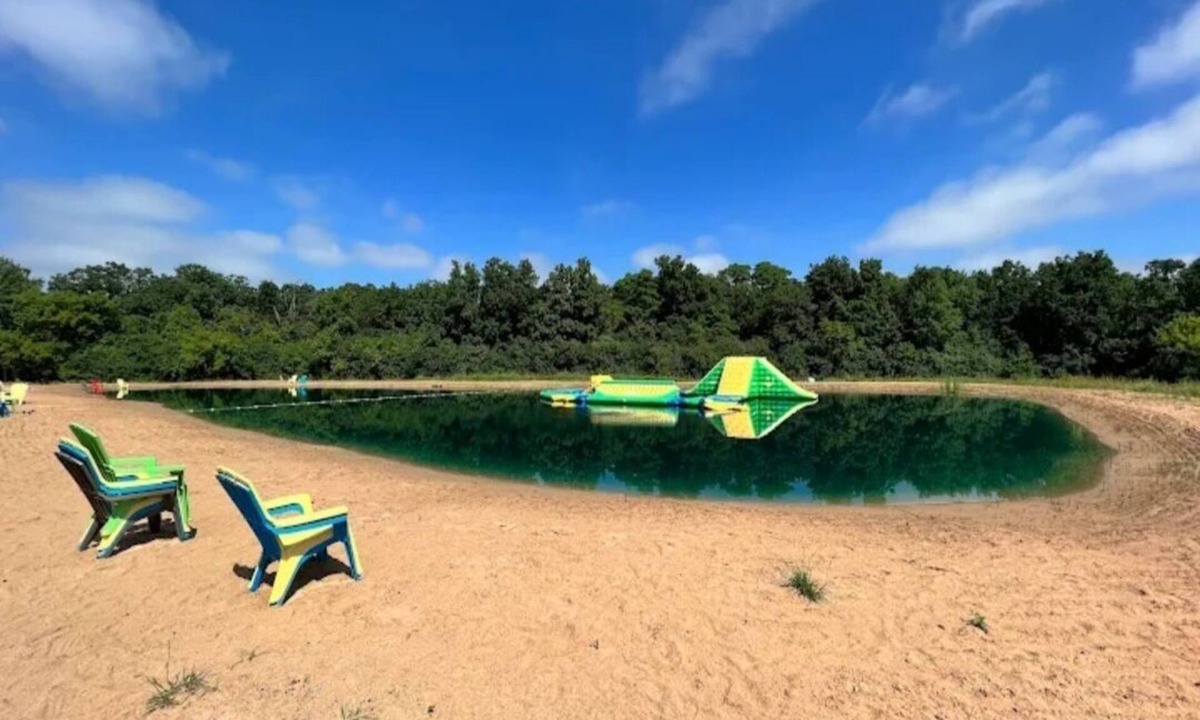 Oshkosh RV Rental | Private Paradise Camper Beach, Pond, Firepit