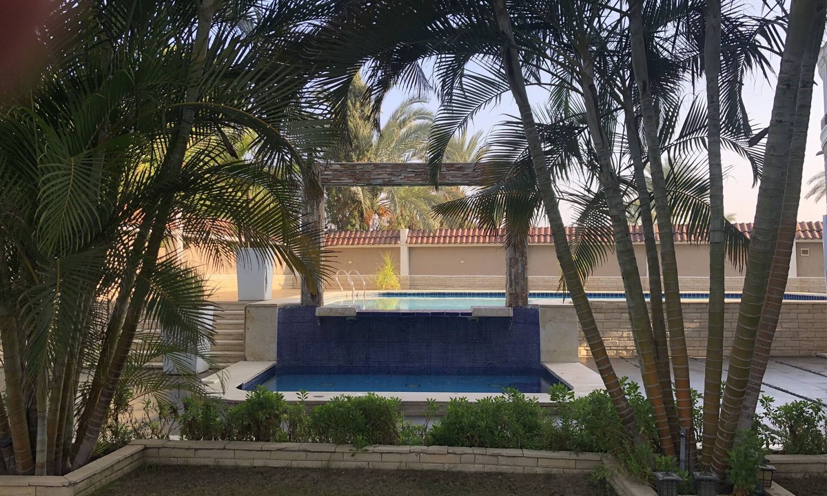 Mobarak City Apartment | Private resort type condo setting with full access to garden and pool