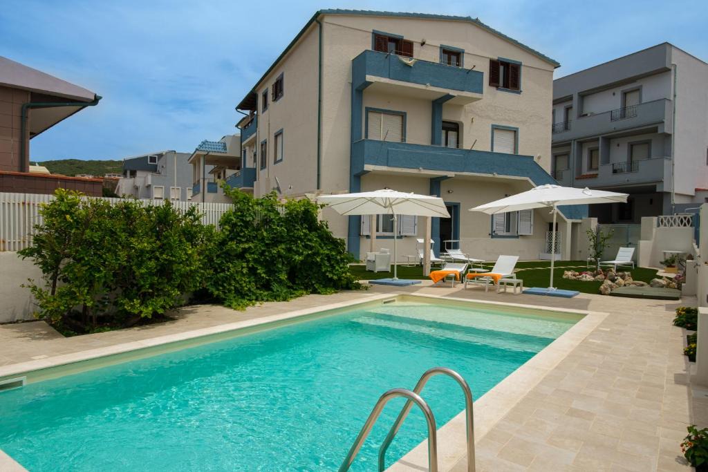 Lu Bagnu House | Private room and pool in the beach free wi-fi