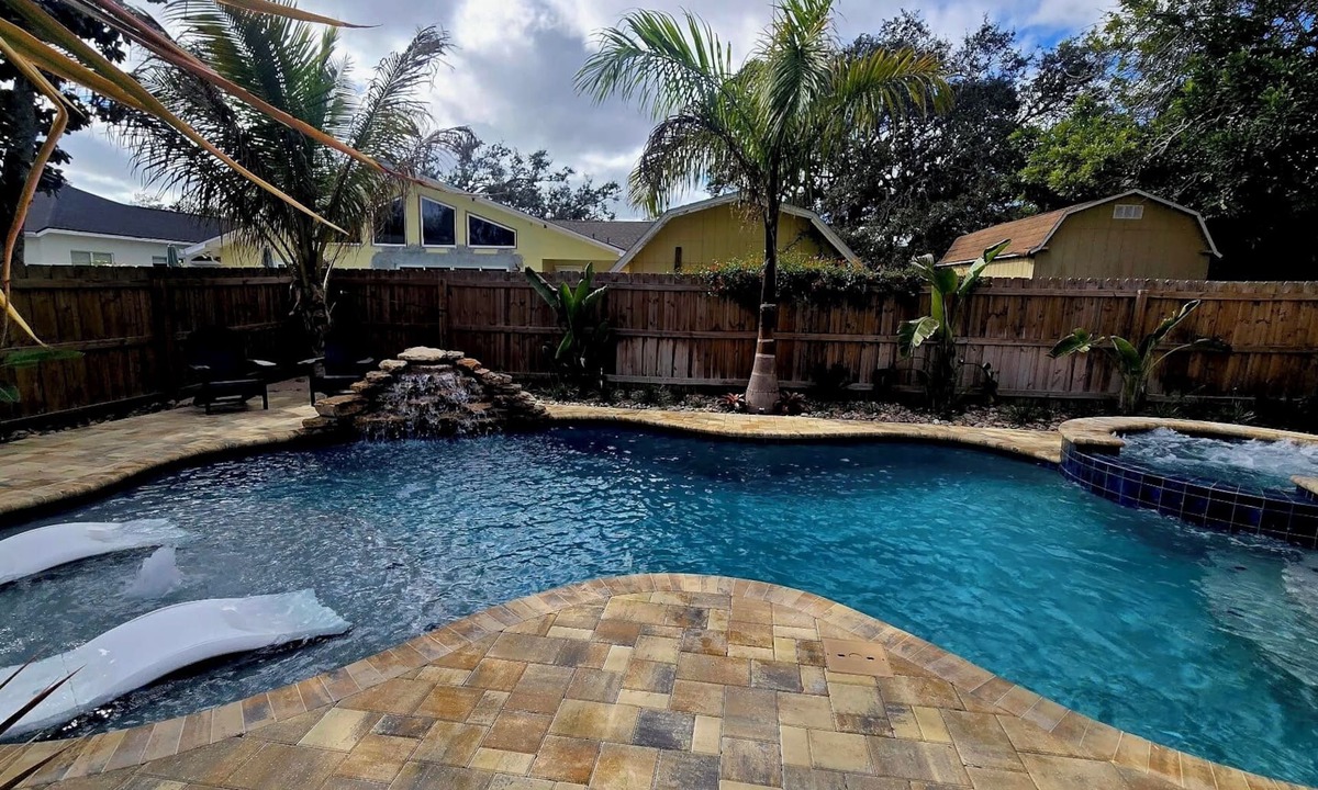 Tarpon Springs House | “Private Tropical Oasis w/Resort Pool, Tiki Bar & Hot Tub"