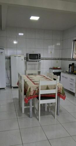 Paulo Lopes House | Proximo a praia da Gamboa com o sossego do campo