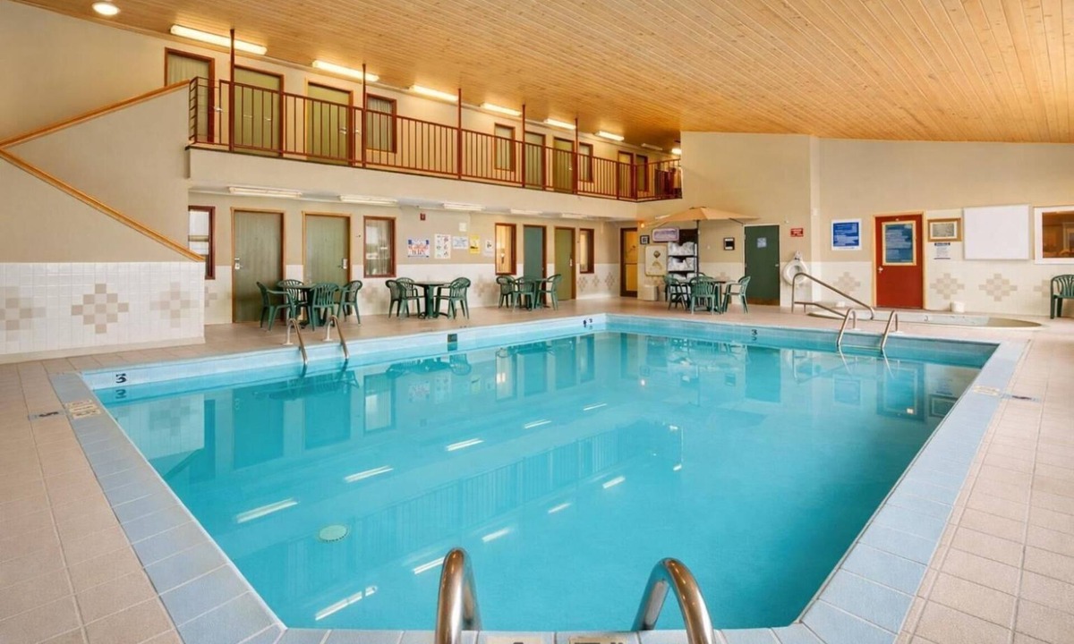 Devils Lake Hotel | Queen Bed Suite near Roosevelt Park | Free Parking & Year-Round Pool Access!