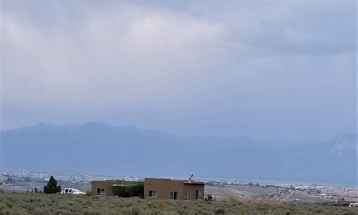 Taos House | Quiet, Pet Friendly Home with Mountain Views. Fenced area for dogs to roam