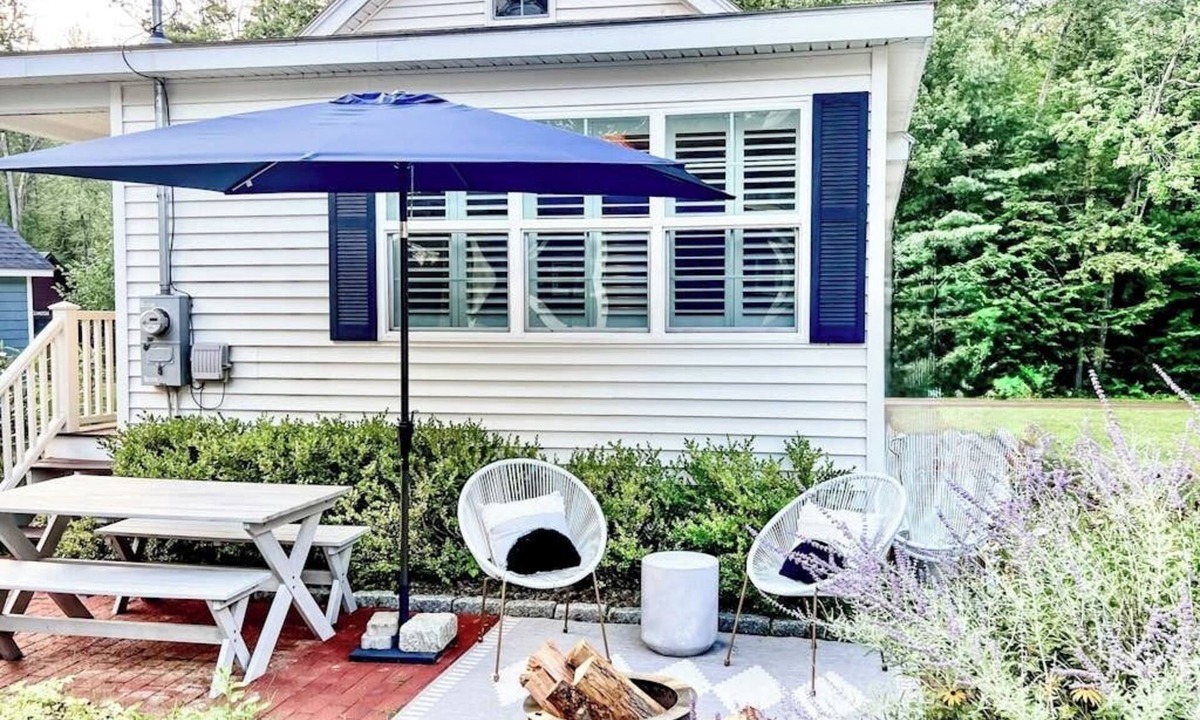 Meredith Cottage | Quintessential lakeside cottage with swimming, picnic tables, & mountain view