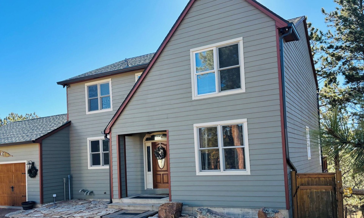 Divide House | Rangeview Mountain Retreat- tucked into the woods with views of Pikes Peak!