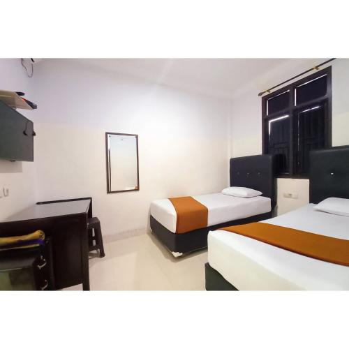 Muara Bungo Hotel | RedDoorz Syariah near Universitas Muhammadiyah Bungo