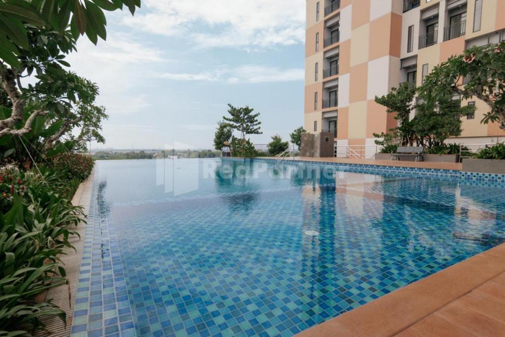 Bekasi Timur Hotel | Redliving Apartemen Sayana - Hazelnut Property Tower Cha