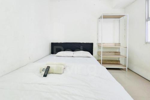 South Tangerang Apartment | RedLiving Apartemen Urbantown Serpong - Aurora Rooms