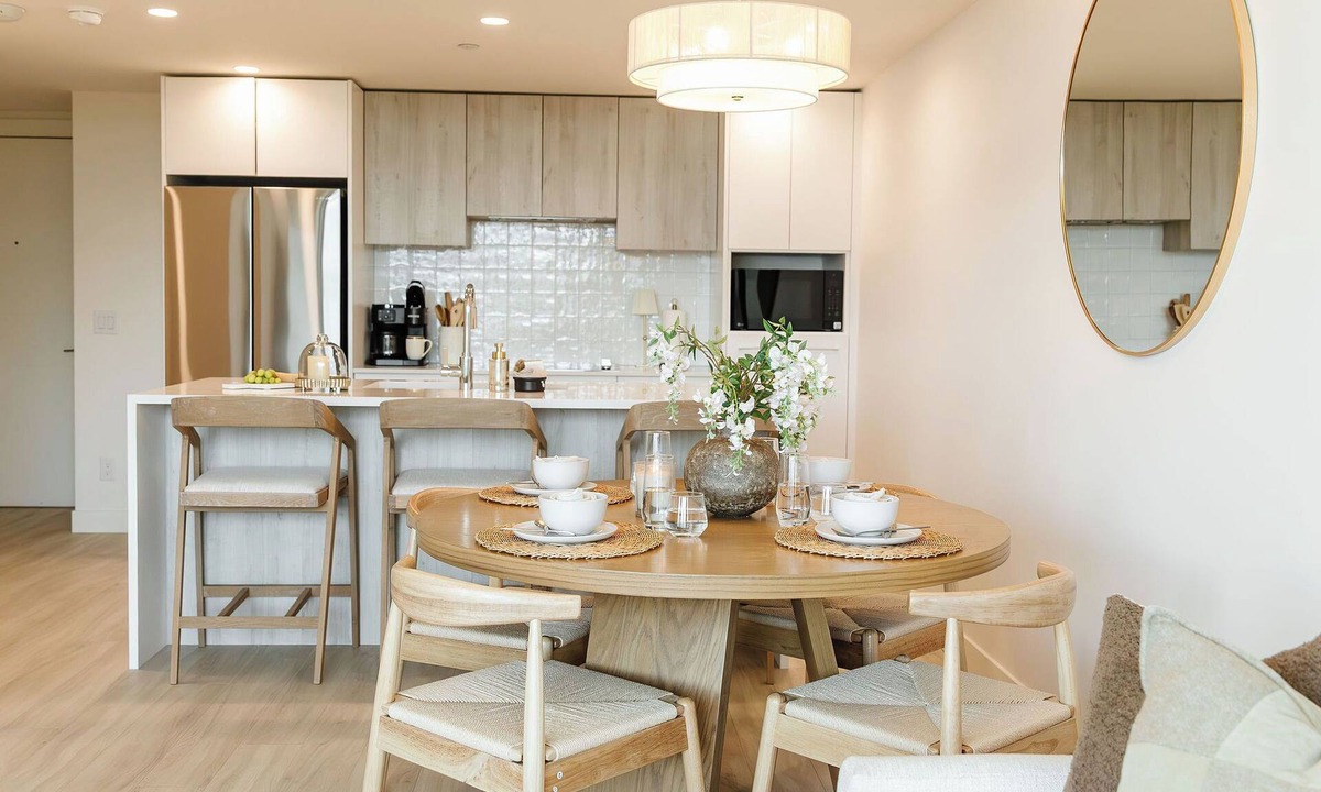 South Pandosy Condo | Relax in a modern 2 bedroom lakefront condo at Aqua Waterfront Village. You get lake views, stylish interiors, a pool, hot tub, gym, secure parking, plus quick access to wineries, cafés, trails & beaches. Perfect for a peaceful Kelowna getaway.