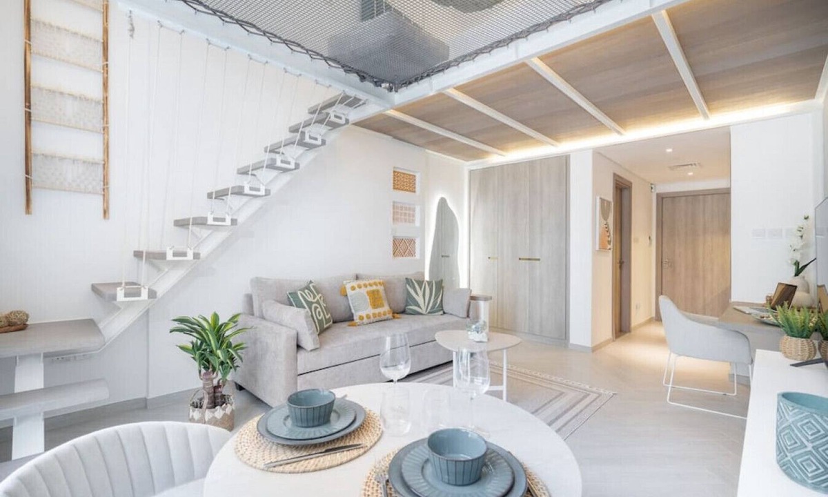Jumeirah Village Circle Apartment | Relax & Recharge Studio Loft with hanging net