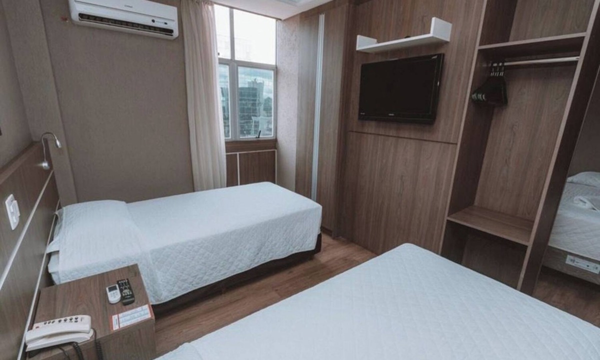 Civic Center Hotel | Relax + Work: Triple Twin Suite w/Rooftop Sauna, Fitness Center
