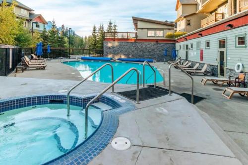 Canmore Apartment | Renovated 2BR, Heated Pool, 3 Hot Tubs, Pets ok!