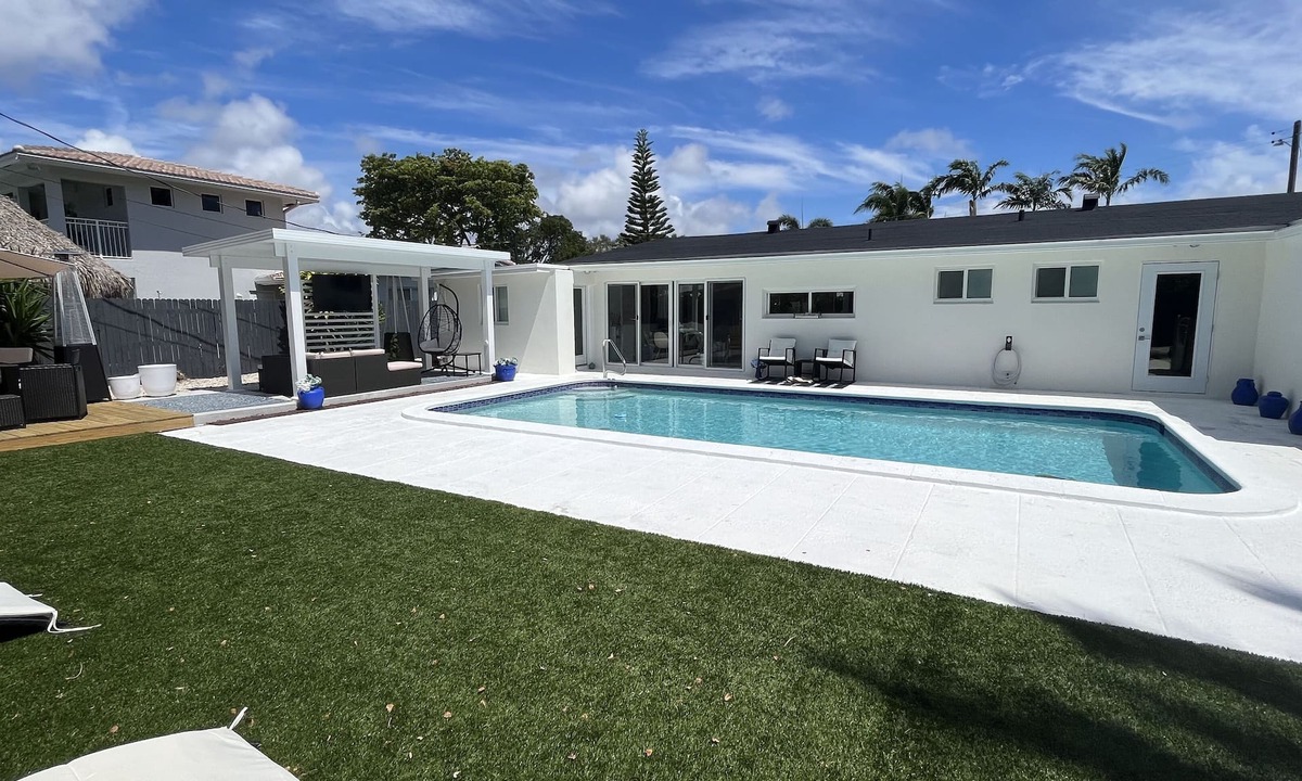 Deerfield Beach House | RESORT-STYLED 3 BDR HOME -HEATED POOL -UNDER A MILE FROM THE BEACH Huge Backyard