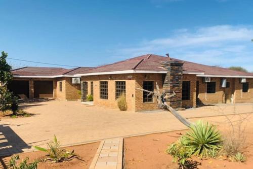 Molepolole Villa | Rest and Work at Los Abrigos Villa in Molepolole