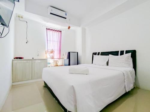 Jatingaleh Apartment | Restful and Tidy Studio at Paltrow City Apartment By Travelio