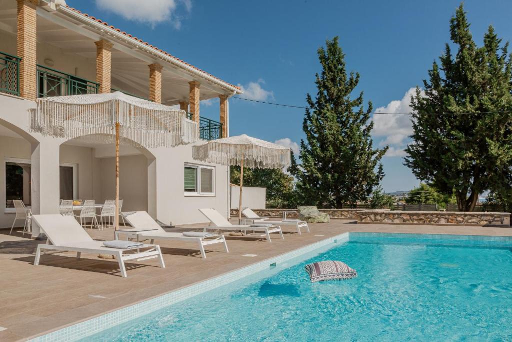 Porto Koukla Villa | Rivazzurra Beachfront Luxury Villa