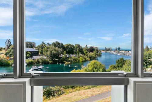 Nukuhau Apartment | Riverfront Apartment With Views and Pool Access