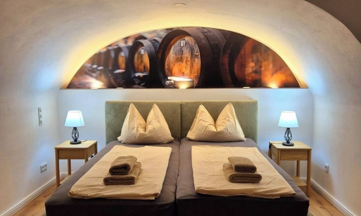 Dhron Apartment | Romantic accommodation on the Moselle. Sleep in the historic wine cellar.