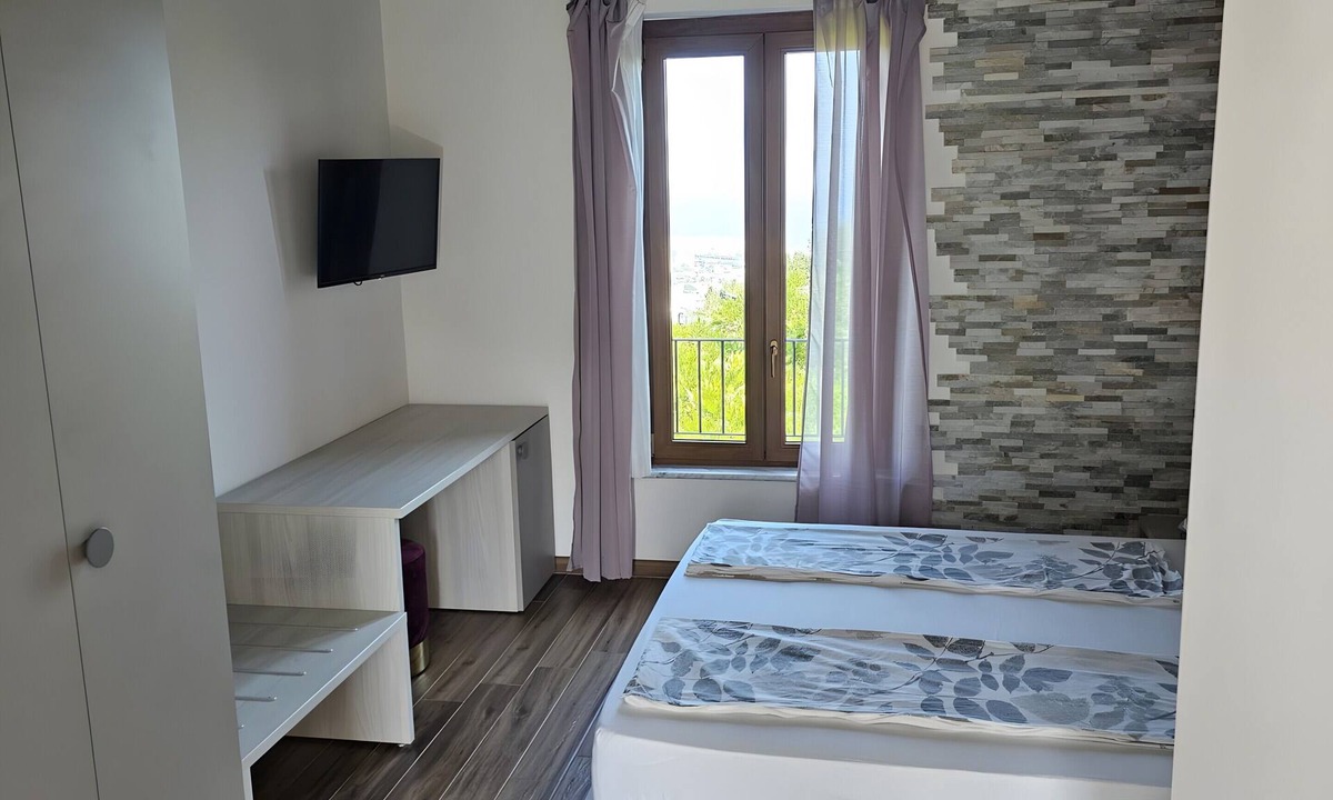 Savona Apartment | Room 'Camera Matrimoniale' with Sea View, Wi-Fi and Air Conditioning