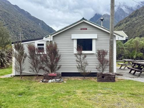 Otira House | Rustic, Basic Cosy Alpine Hut, in the middle of the Mountains but near road & Railroad