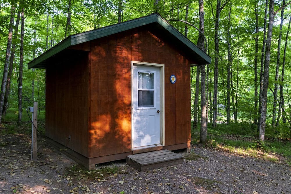White Lake Cabin | Rustic Cabin Nestled in the Trees for a Unique Outdoor Experience in White Lake, Wisconsin