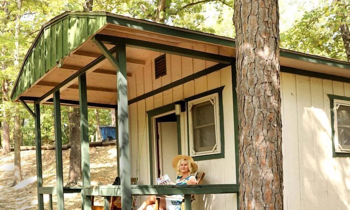 Branson Cabin | Rustic Camper Retreat with Fire Pit & Rocking Chairs in Branson, Missouri