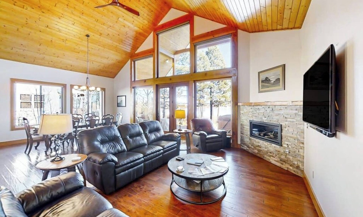 Pagosa Springs House | Rustic lakefront getaway with mountain views - dock, hot tub, fireplace & W/D