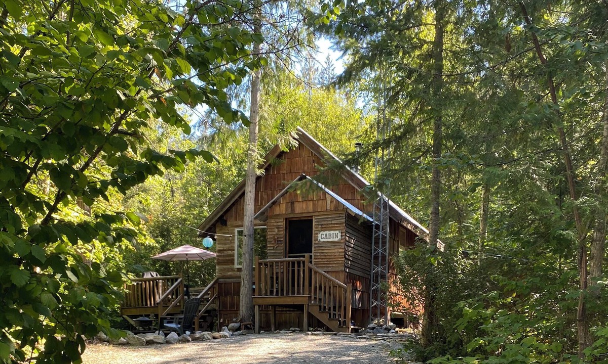 Mara Cabin | Rustic Solar cabin in the woods off grid glamming at its finest near Mara lake