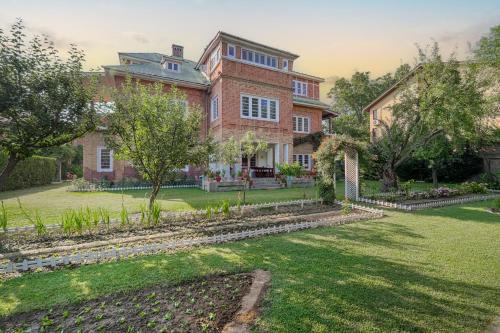 Srinagar House | SaffronStays Awakening - 5BR heritage villa with Kashmiri art, nature walks & authentic cuisine near River Jhelum, Srinagar