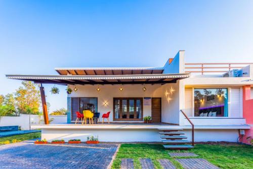 Anjaneri Villa | SaffronStays Blue Jasmine - twin 2BR pet-friendly villas with plunge pool, gardens & birdwatching near Sula Vineyard